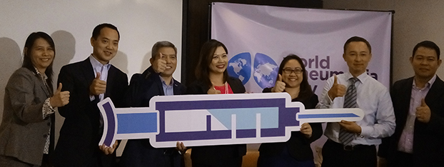 Drs. Rontgene Solante and Dr. Katrina Florcruz (second and fourth from left), together with Pfizer officers and other guests who attended the World Pneumonia Day event. ​